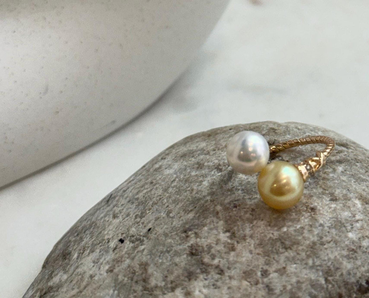Adjustable S925 sterling silver ring featuring golden freshwater pearls with beautiful reflective luster.