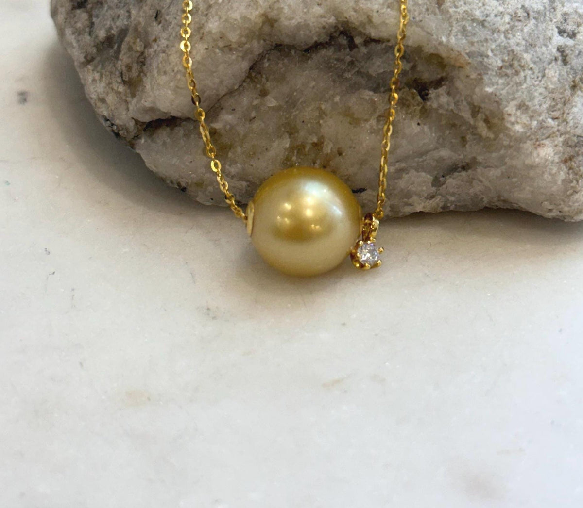 Deep tea golden pearl pendant with strong luster and smooth round shape