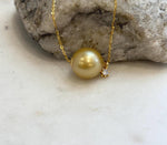 Deep tea golden pearl pendant with strong luster and smooth round shape