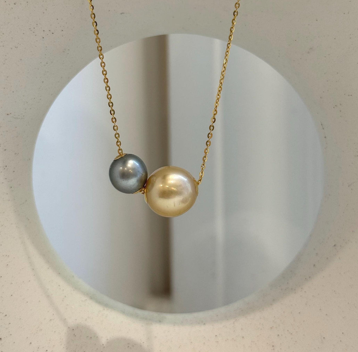 Genuine saltwater pearl pendant featuring Tahitian and deep golden South Sea pearls