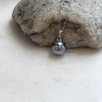 Platinum blue Tahitian pearl pendant necklace with a crystal-accented sterling silver setting