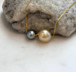 Elegant floating pearl pendant with contrasting Tahitian and deep golden pearls