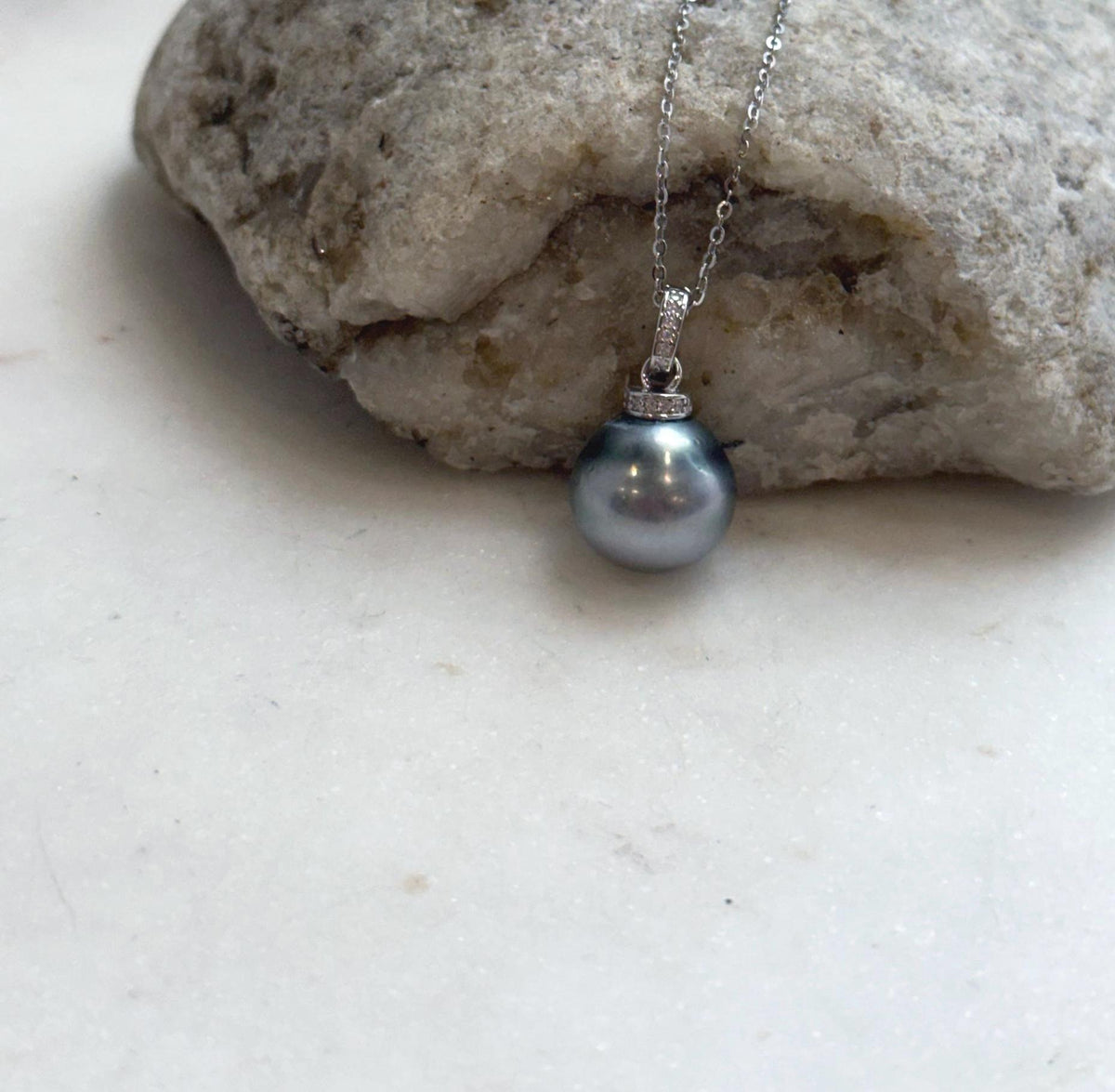 Platinum blue pearl necklace with an elegant S925 sterling silver pendant setting