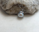 Silver taupe pearl pendant with an S925 sterling silver persimmon-inspired setting.