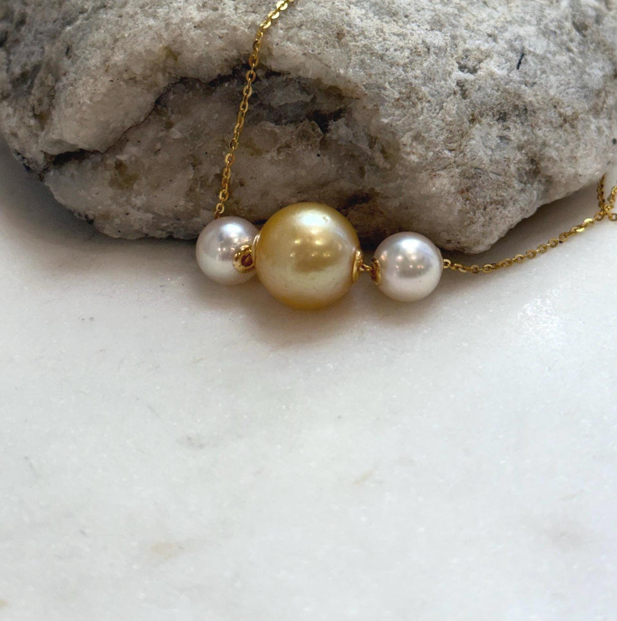 Three pearl pendant featuring South Sea golden pearls and Akoya saltwater pearls