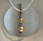 Mini white pearl strand necklace with Tahitian Keshi and golden pearl pendant