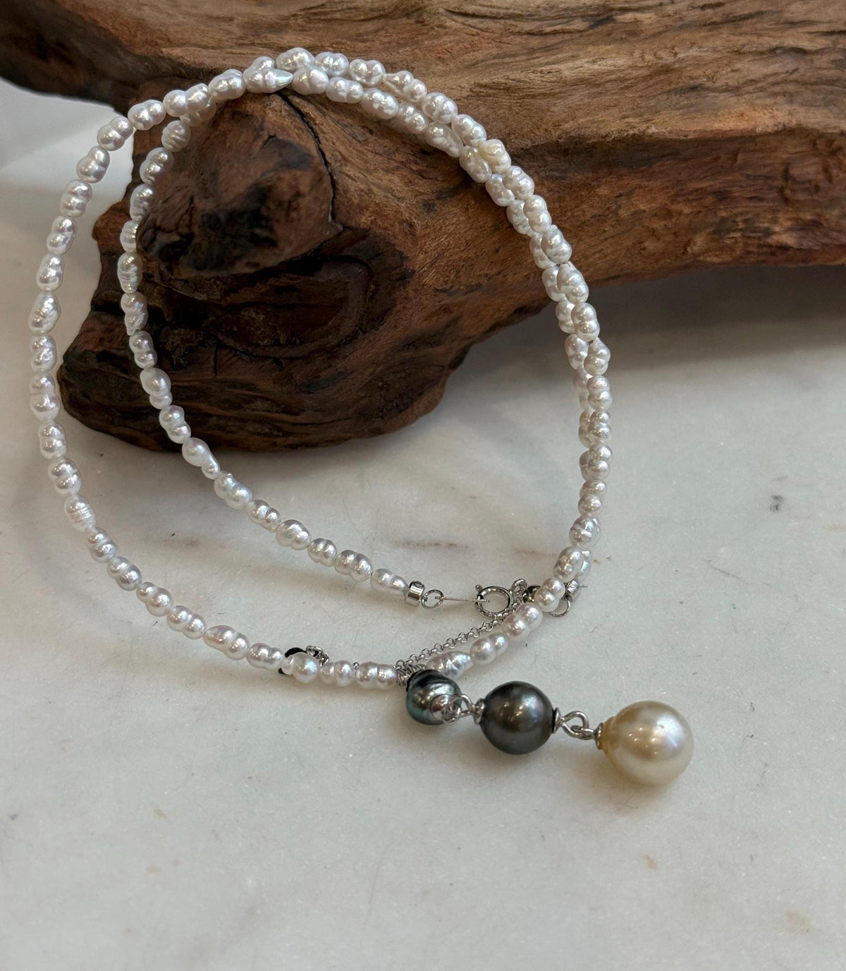 Mini white pearl strand necklace with natural Tahitian Keshi and golden pearl drops
