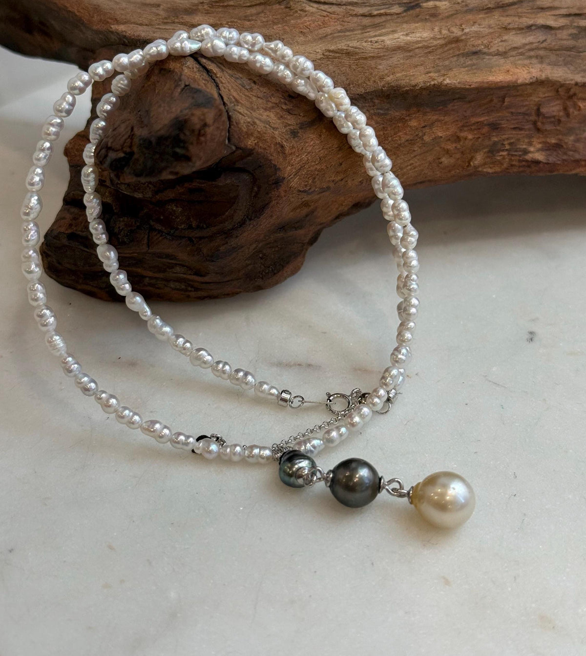 Luxury Tahitian Keshi and South Sea golden pearl necklace with petite white pearl strand