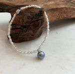 Platinum color Tahitian pearl drop on a dainty white pearl necklace