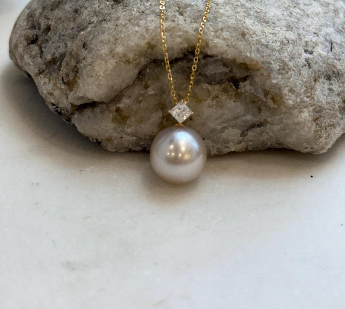 Elegant South Sea champagne pearl pendant with extreme mirror luster.