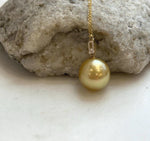 Genuine saltwater South Sea golden pearl pendant with rich deep tea color.
