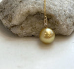 Deep tea golden South Sea pearl pendant with bright mirror luster and Moissanite.