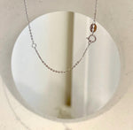 Tahitian pearl pendant with a crystal halo and silver chain.