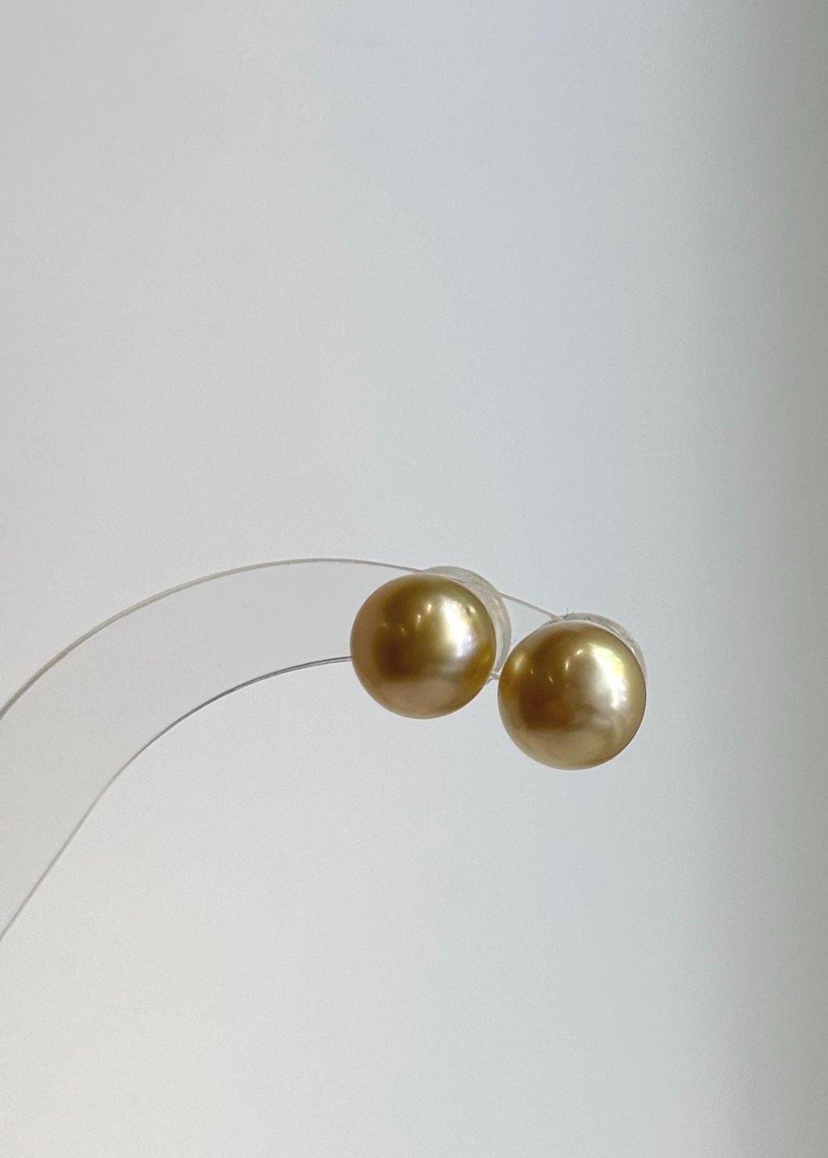 Lustrous South Sea pearl earrings with S925 silver settings.