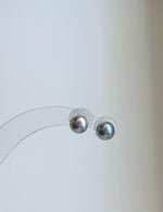 Cool-toned silver blue pearl stud earrings for women