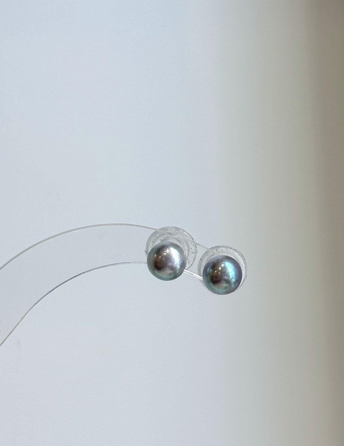 Cool-toned silver blue pearl stud earrings for women