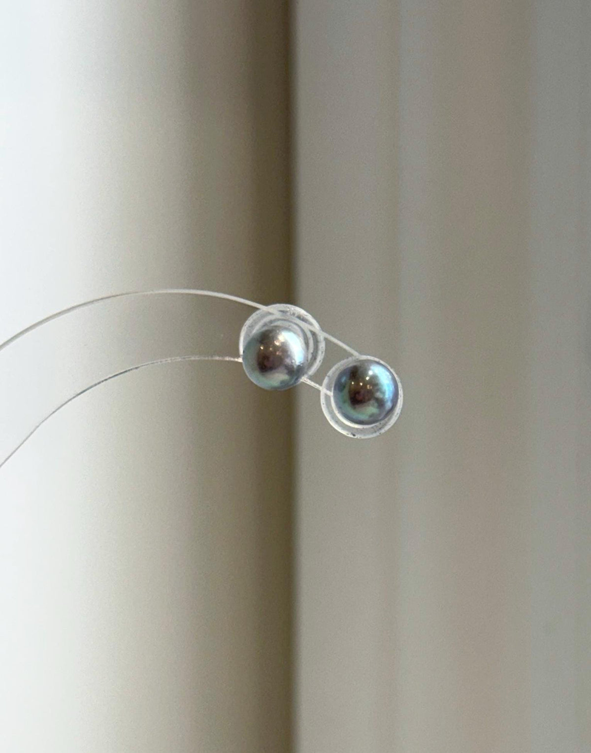 S925 sterling silver stud earrings featuring luminous Akoya pearls