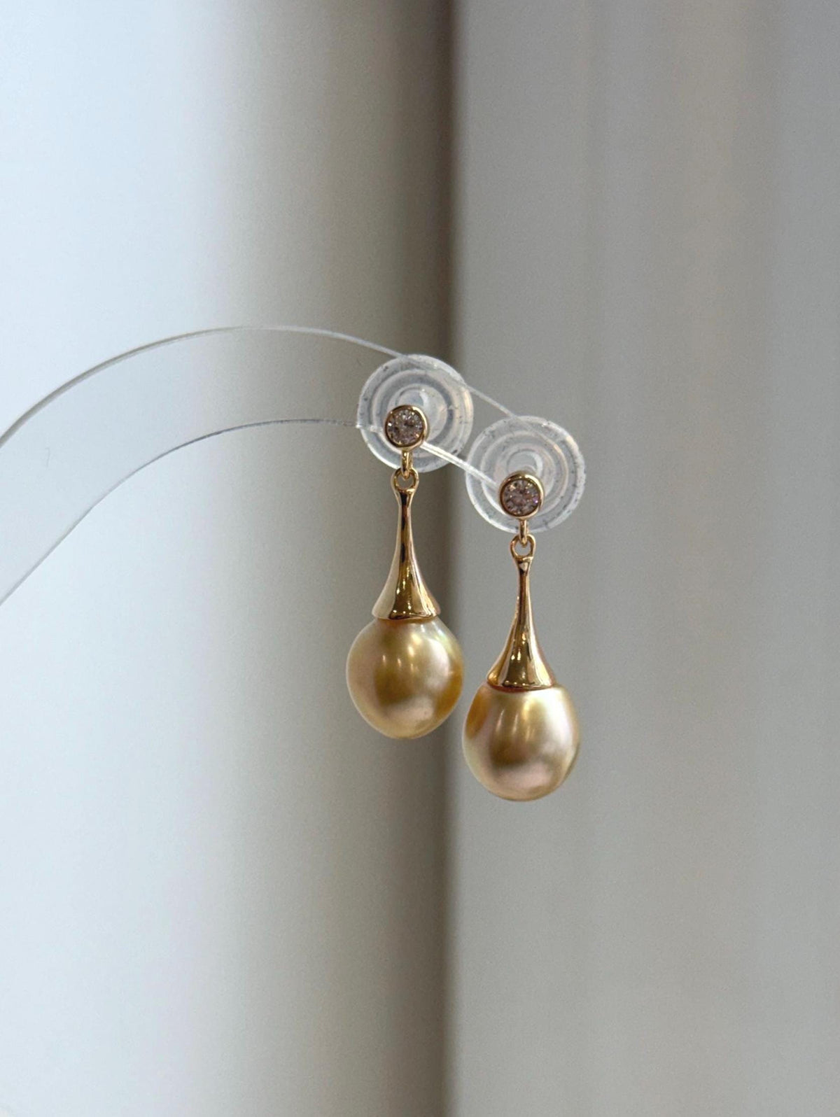 Genuine saltwater baroque pearl earrings with intense mirror reflections