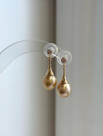 Genuine saltwater baroque pearl earrings with intense mirror reflections