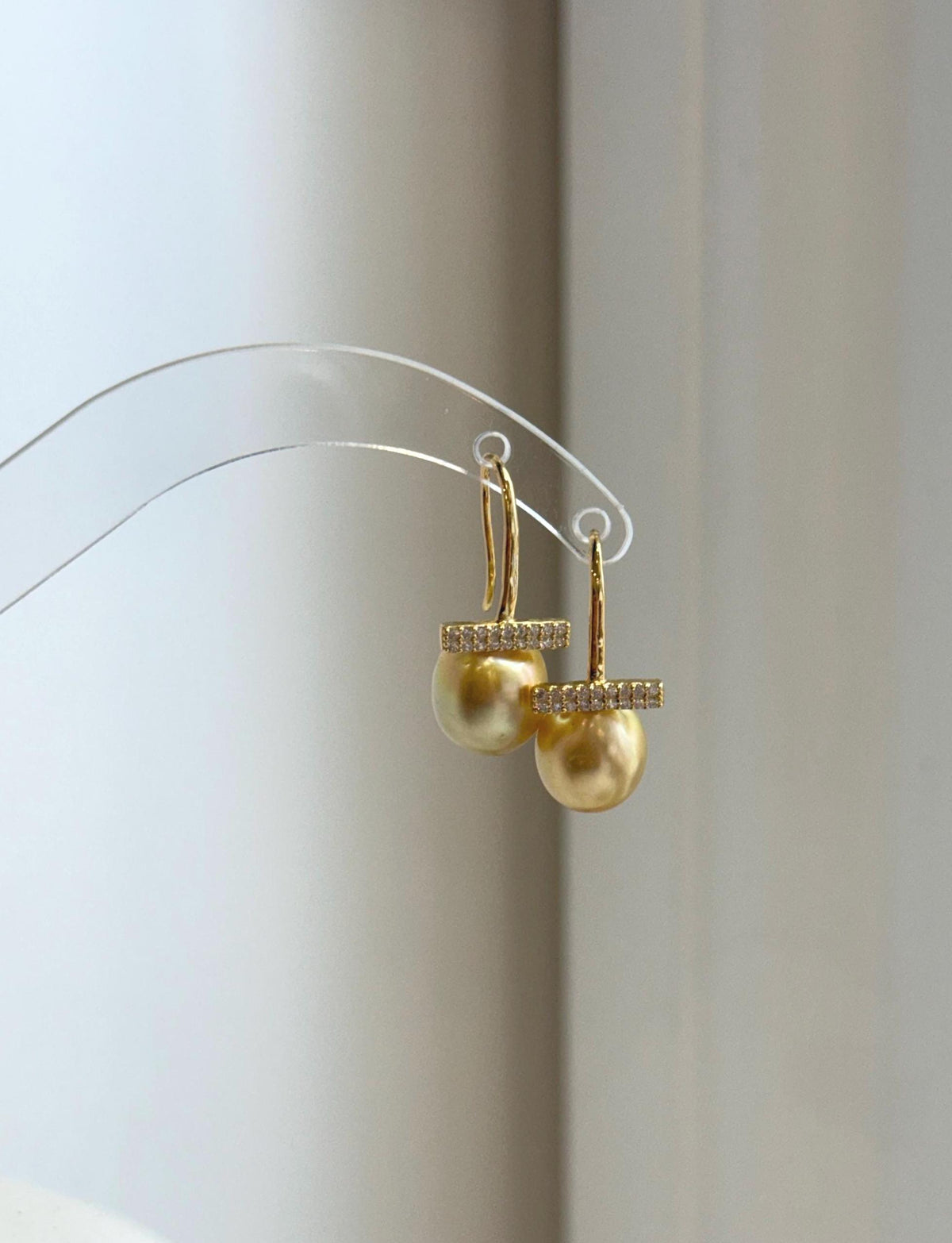 Elegant South Sea pearl drop earrings in a sophisticated hook design
