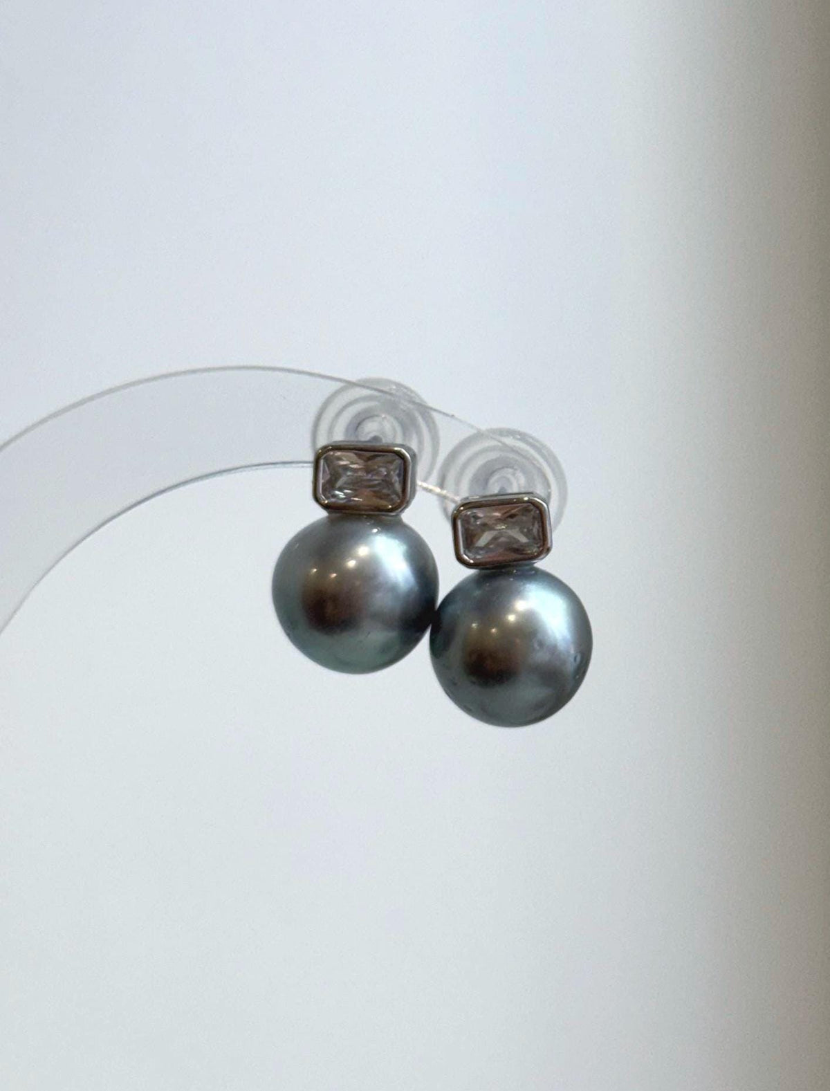 Tahitian platinum pearl stud earrings with sparkling rectangular moissanite accents
