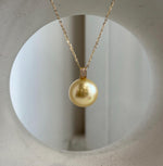 South Sea golden pearl pendant with moissanite and solid 18K gold.