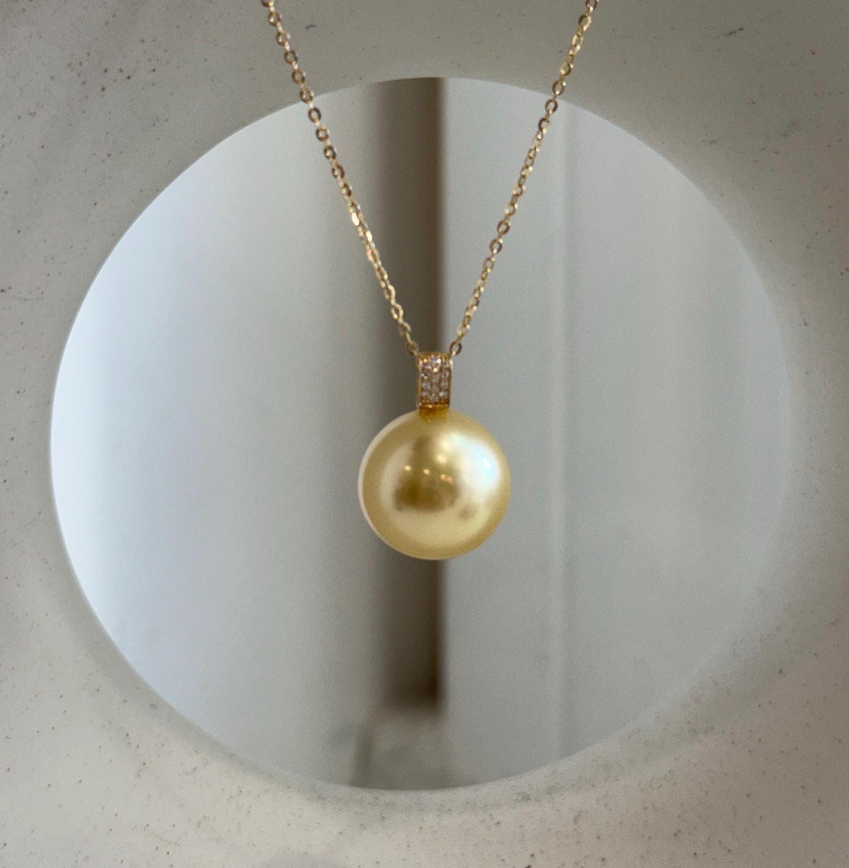 South Sea golden pearl pendant with moissanite and solid 18K gold.