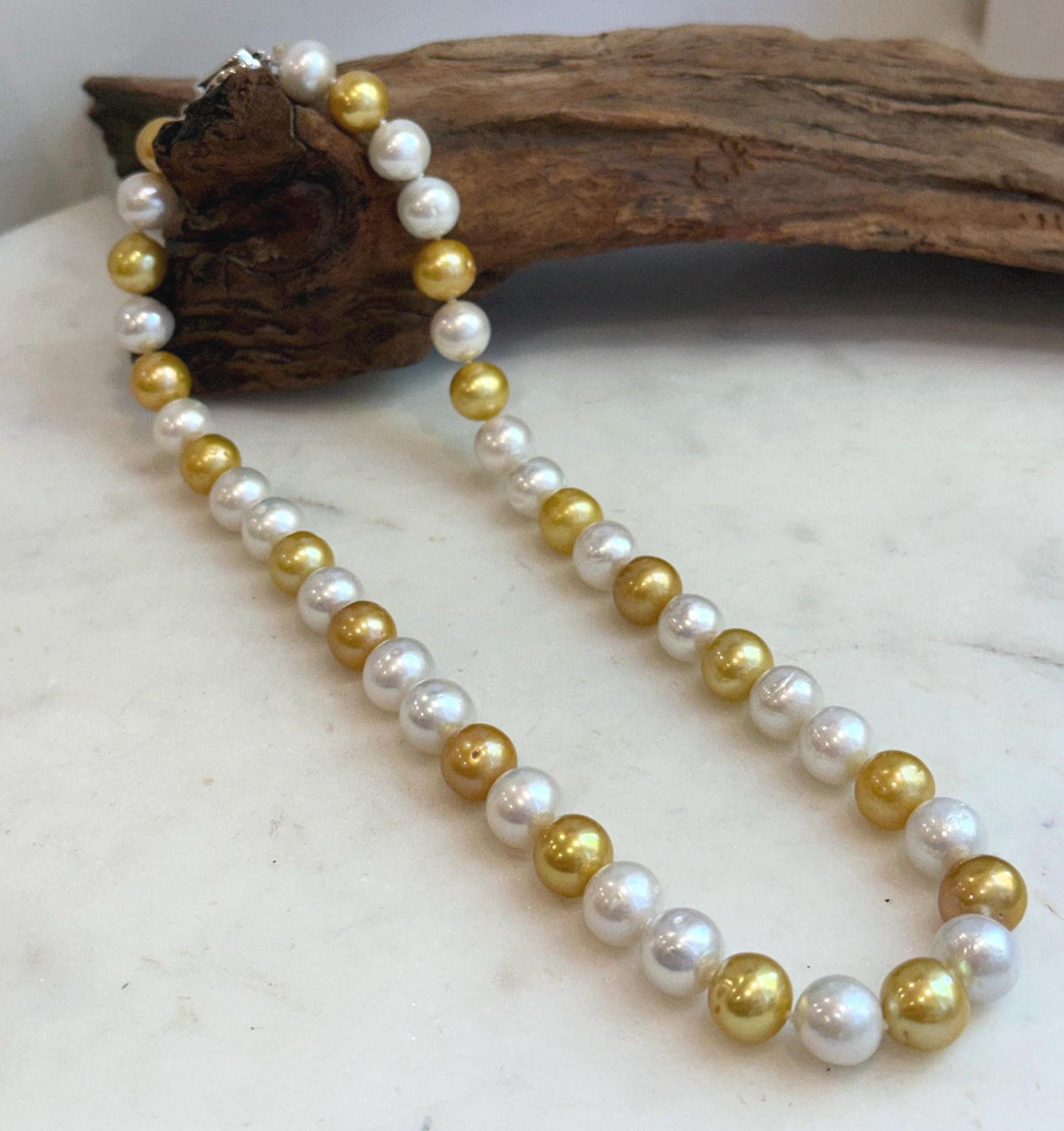 Detail of the rounded pearls and their individual natural surface characteristics.