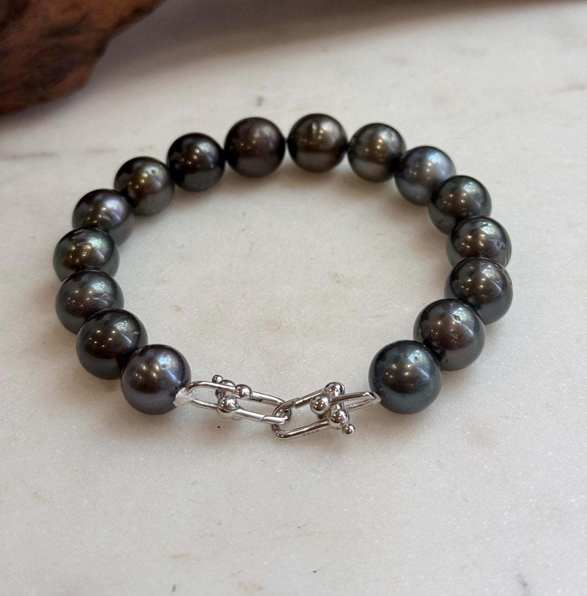 Genuine saltwater pearl bracelet with a sterling silver clasp.