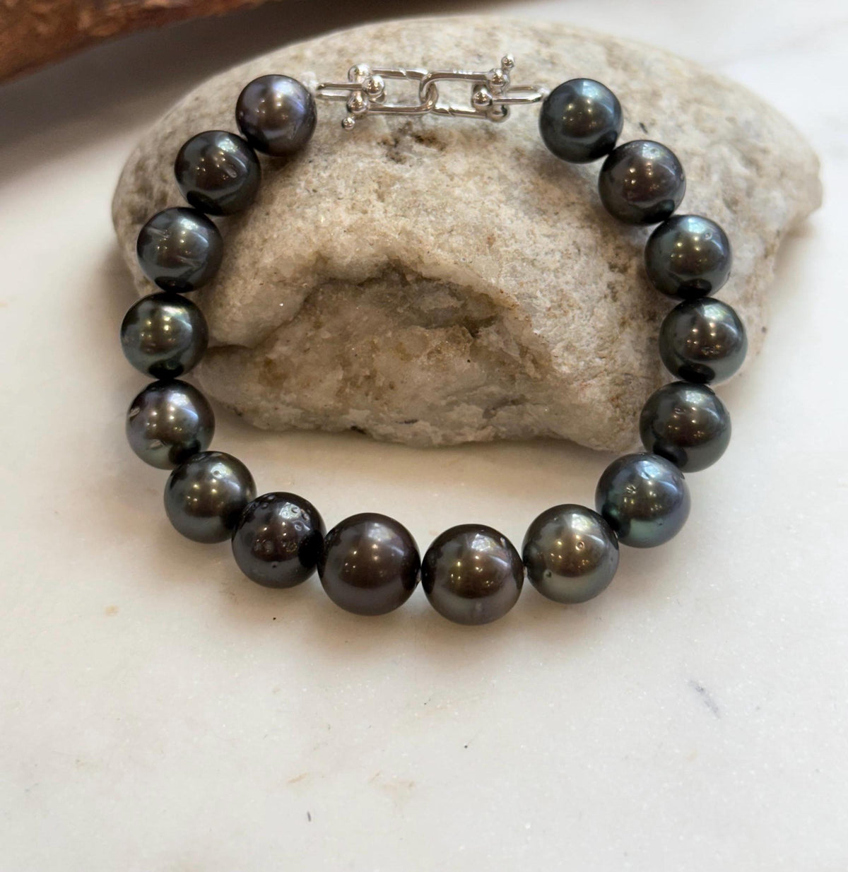 Platinum-toned Tahitian pearls on a classic pearl bracelet.