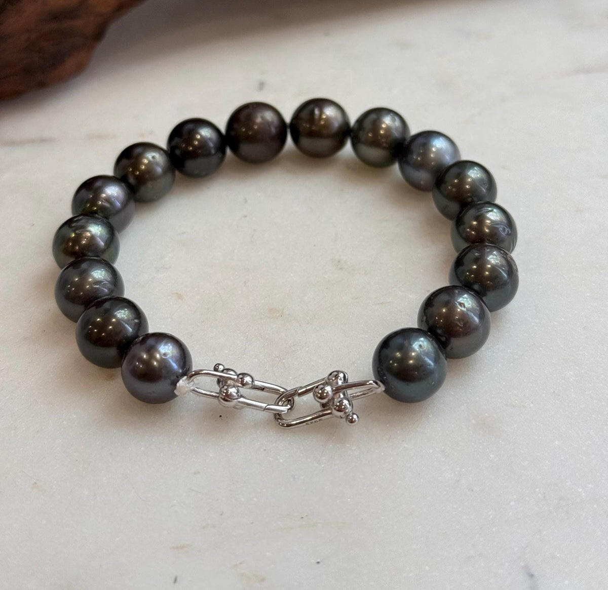 Genuine Tahitian pearl bracelet finished with sterling silver.