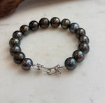 Genuine Tahitian pearl bracelet finished with sterling silver.