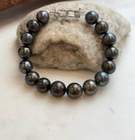 Genuine Tahitian pearl bracelet finished with sterling silver.