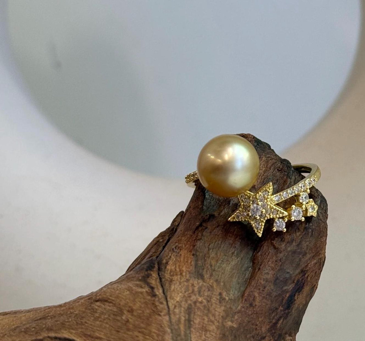 Golden South Sea pearl featured in an adjustable star-design ring made from gold-plated S925 sterling silver.