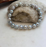 Twenty lustrous Akoya pearls strung into a classic bracelet.