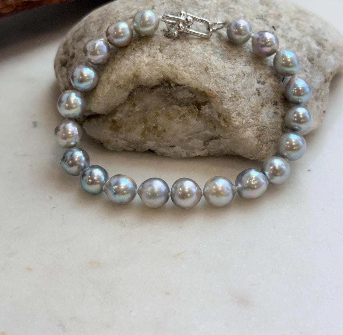 Genuine ocean pearl bracelet with a sterling silver fastening.