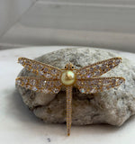 South Sea golden pearl dragonfly brooch pendant with rich tea-colored tones and a highly reflective pearl surface.