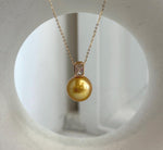 Deep tea golden Edison pearl pendant on an S925 sterling silver necklace.
