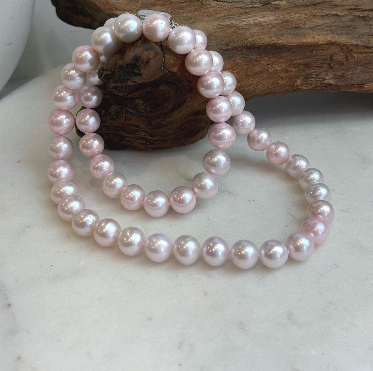 Pale pink freshwater pearl necklace with S925 sterling silver clasp.