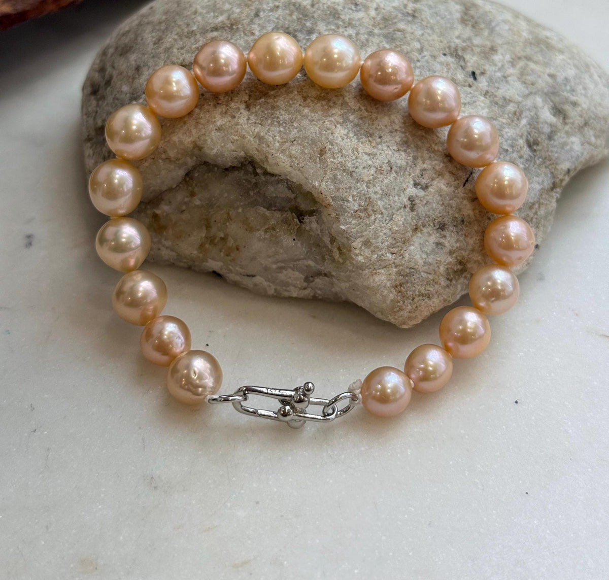 Peach and golden tones on genuine freshwater pearls