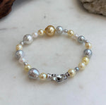 Multicolor ocean pearl bracelet finished with a sterling silver clasp.