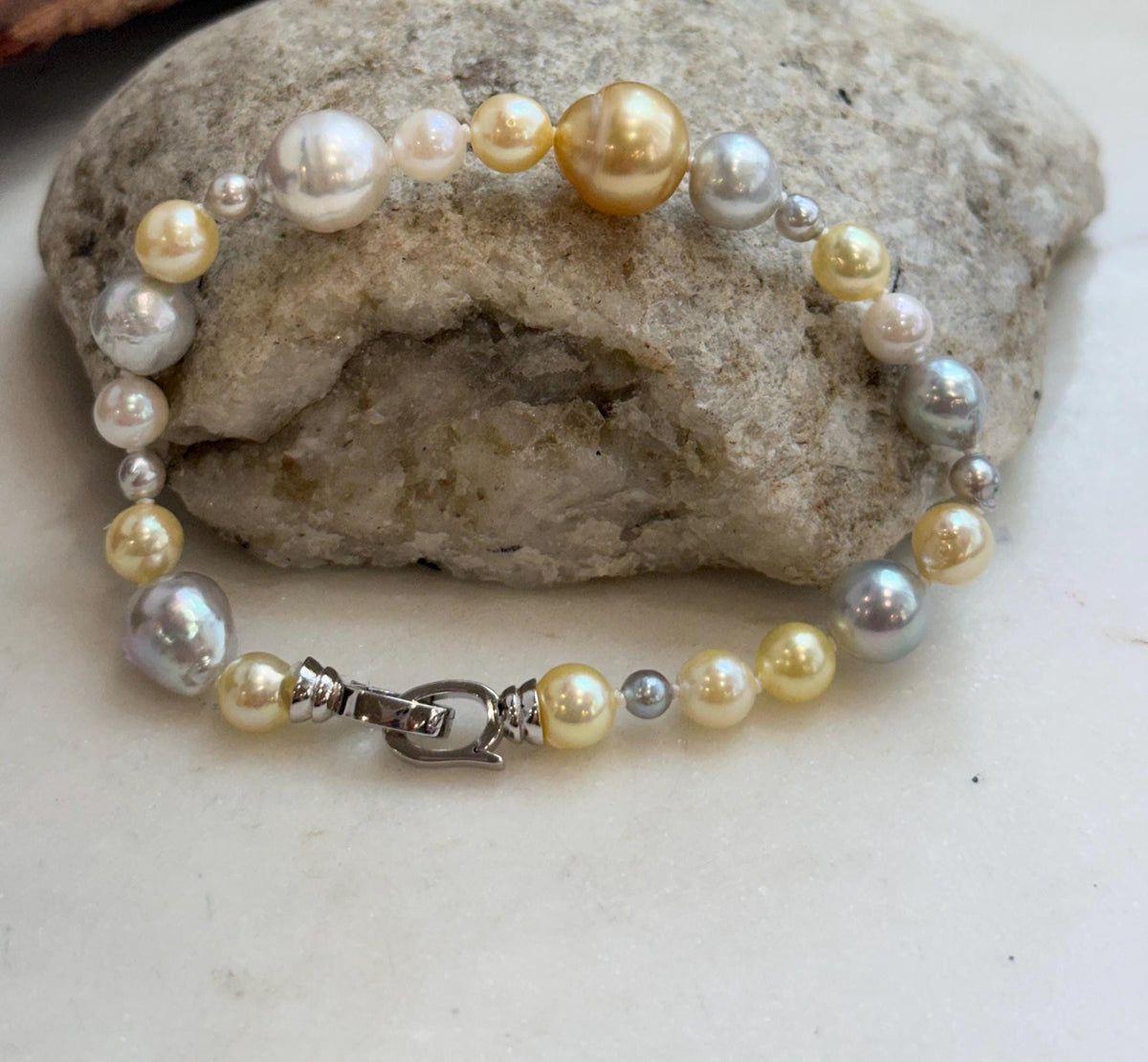 Elly’s genuine saltwater pearl bracelet with mixed pearl sizes and colors.