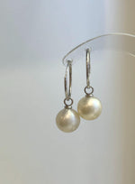 Close-up of white South Sea pearl drops with reflective luster