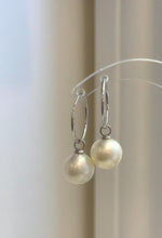 Sterling silver hoop earrings with removable white pearl charms
