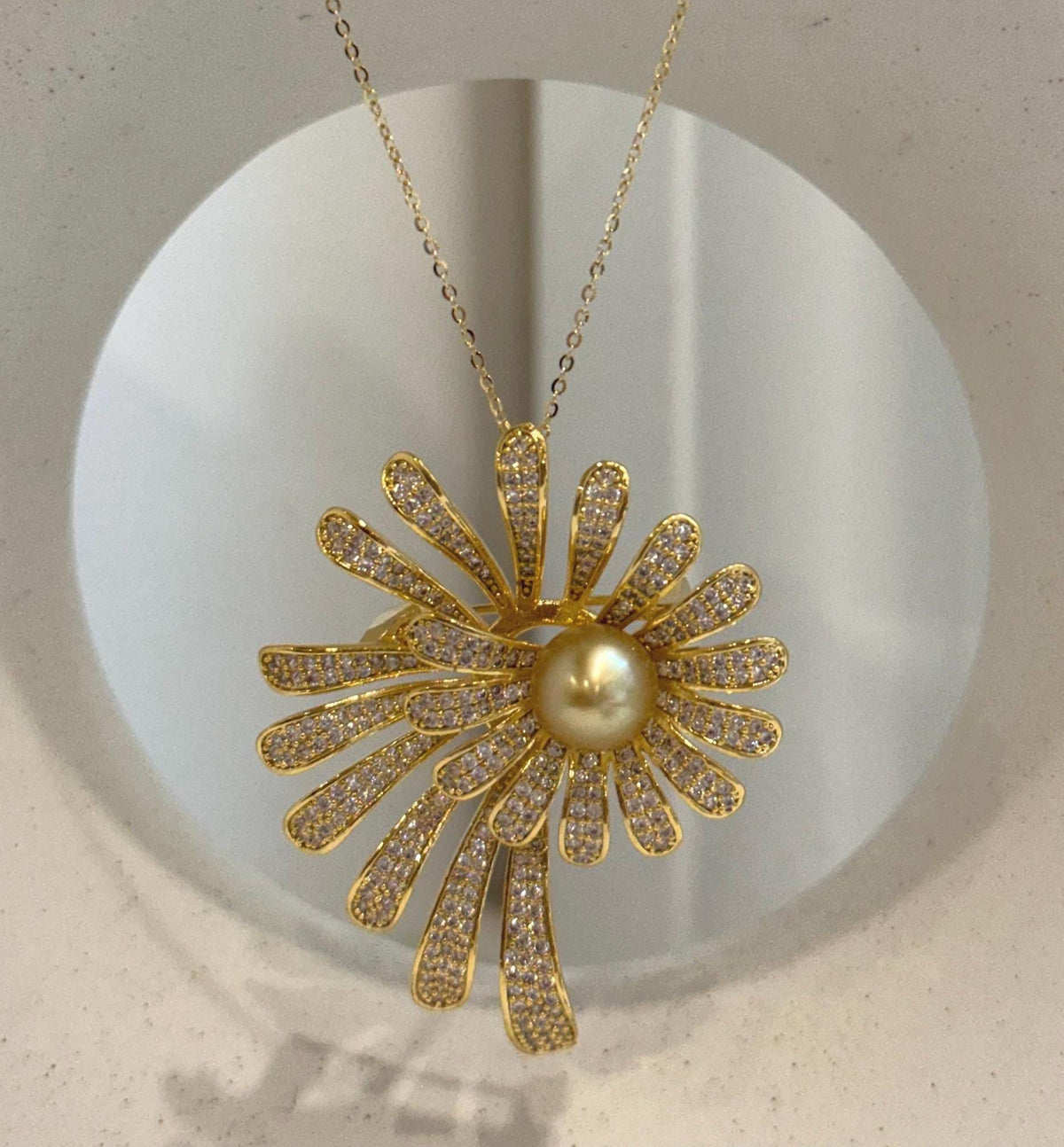 South Sea pearl brooch pendant with an elegant flower motif