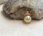 Golden South Sea pearl paired with an 18K gold-plated silver crown setting.