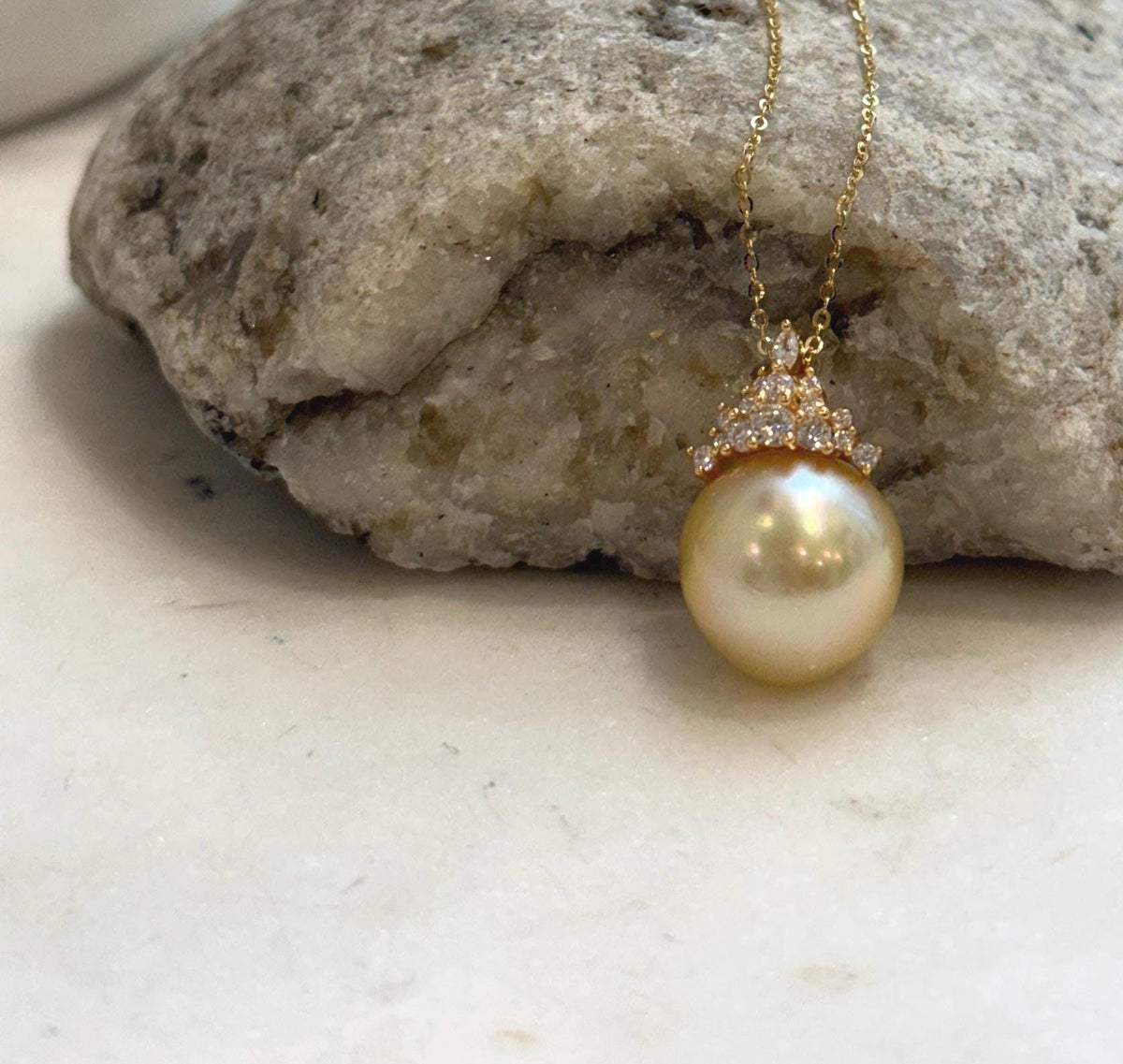 S925 sterling silver crown pendant with 18K gold plating and a genuine South Sea pearl.