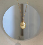 Genuine South Sea saltwater pearl in a sterling silver drop pendant.