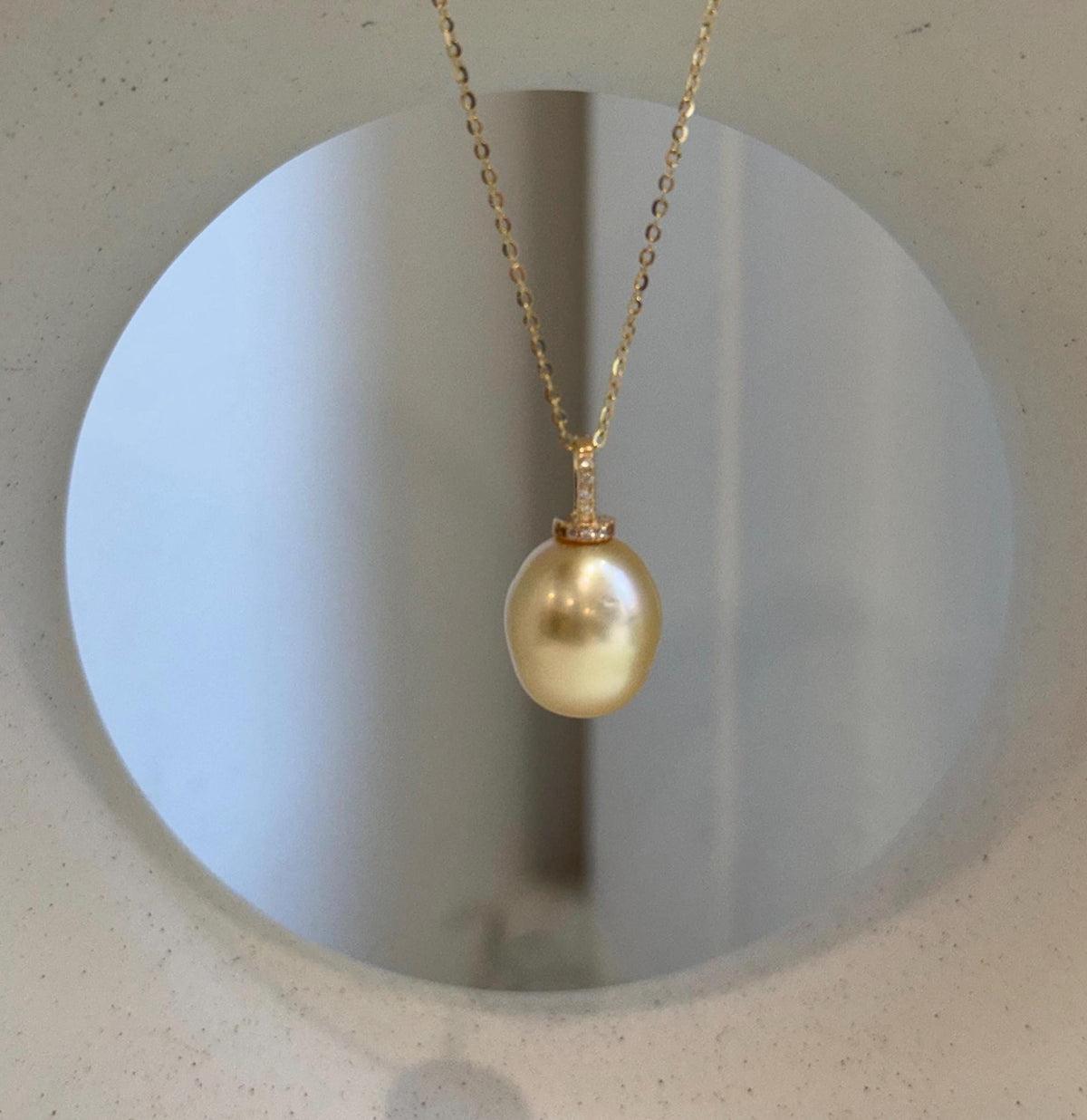 Genuine South Sea saltwater pearl in a sterling silver drop pendant.