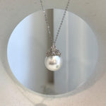S925 sterling silver crown pendant featuring a lustrous Australian white pearl.